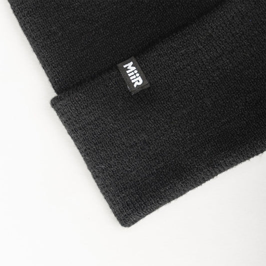 recycled-poly-fine-knit-beanie-i8 WebPDP-RecycledPolyFineKnitBeanie_Studio_TagDetail_Black__BNE005002OS.jpg